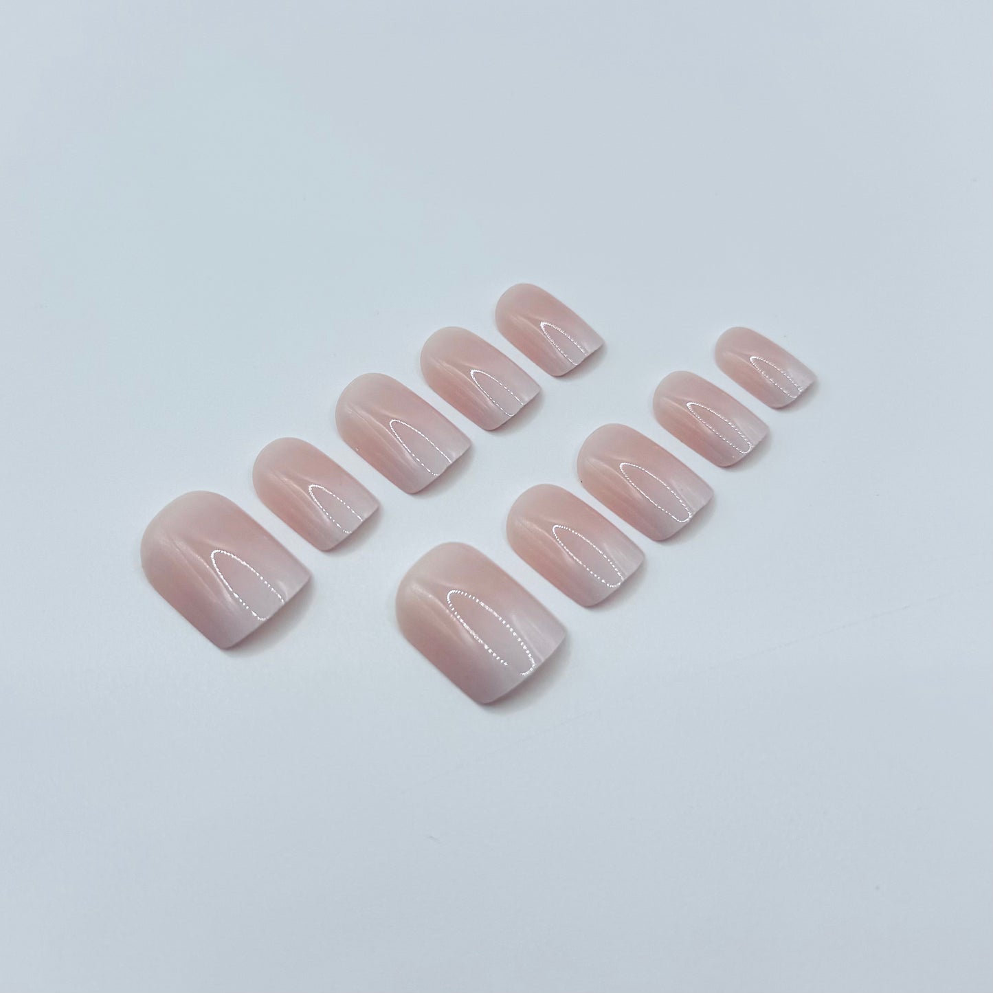 Subtle Ombre press-on nails close-up – reusable ombre nail set by Mani in Minutes