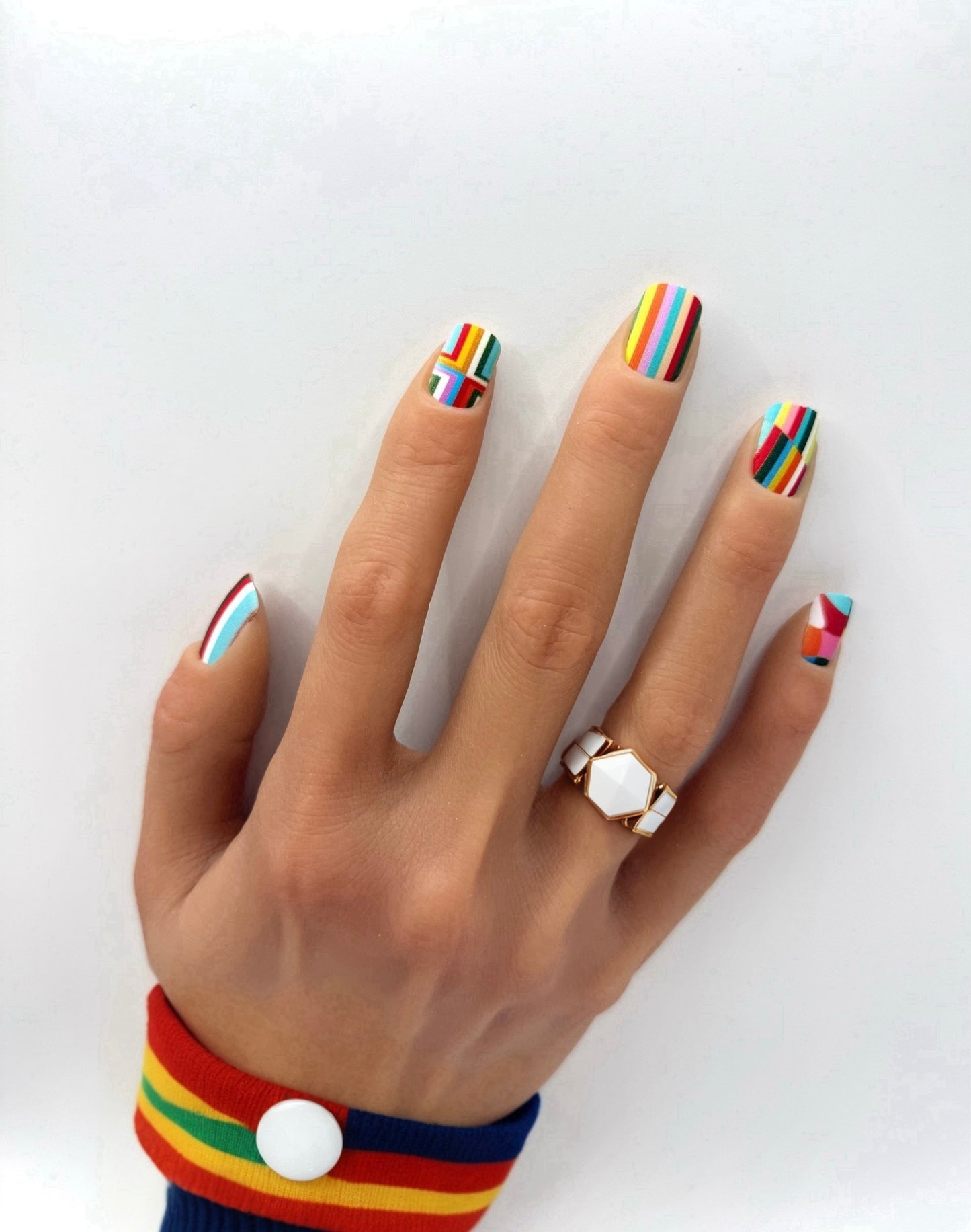 Geometric Glam press-on nails – bold rainbow geometric design by Mani in Minutes