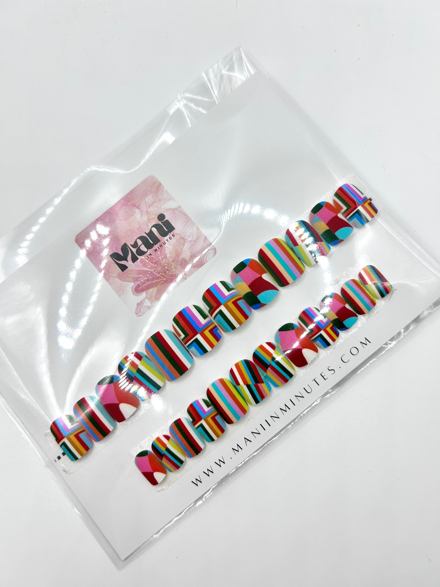 Geometric Glam press-on nails – bold rainbow geometric design by Mani in Minutes