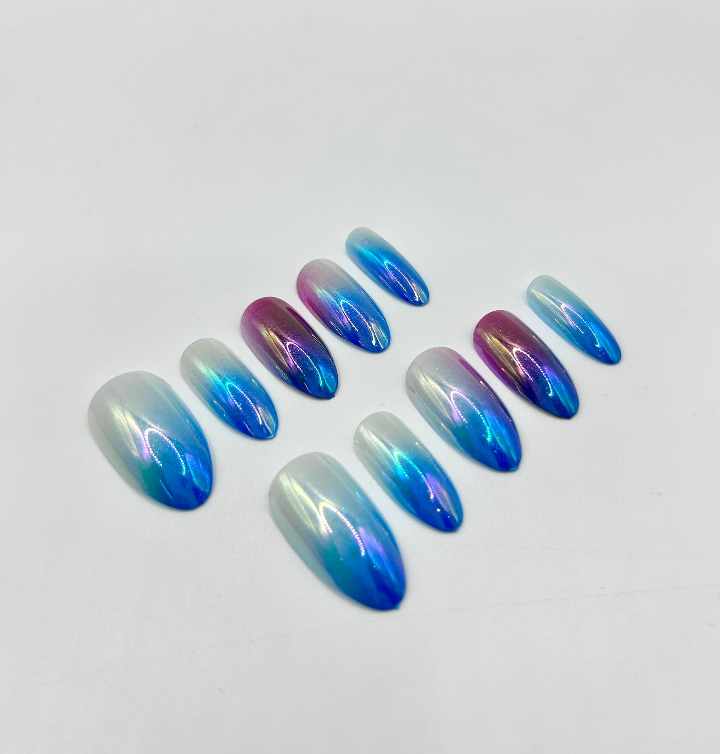 Shimmering opal effect close-up on Aurora Glow press-on nails.