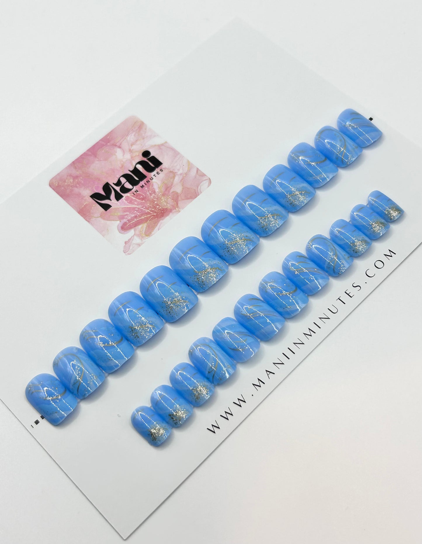 Gilded Ocean mani in Minutes Press on Nails