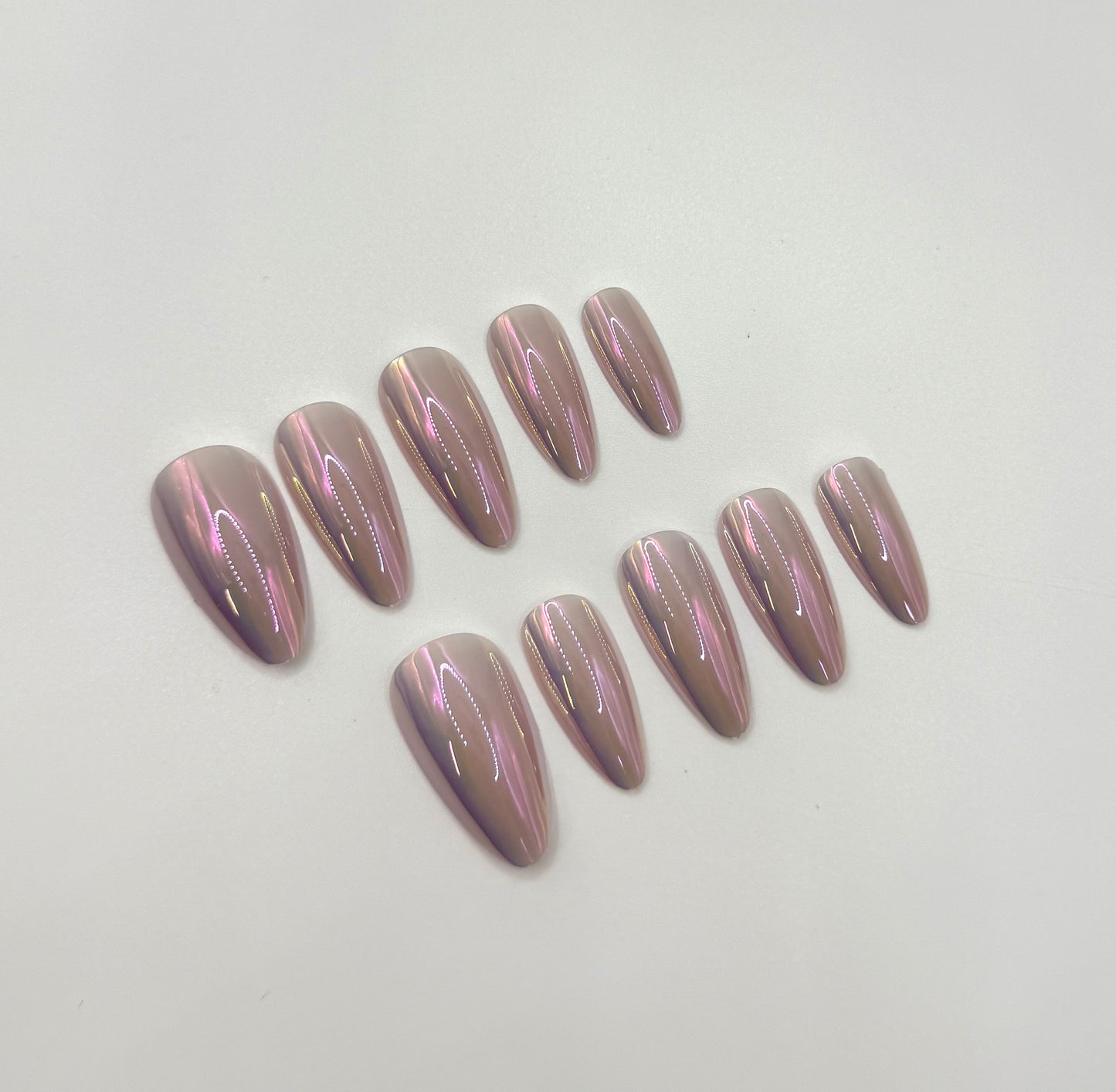 Close-up of Opal Aura press-on nails highlighting the iridescent shimmer – Mani in Minutes