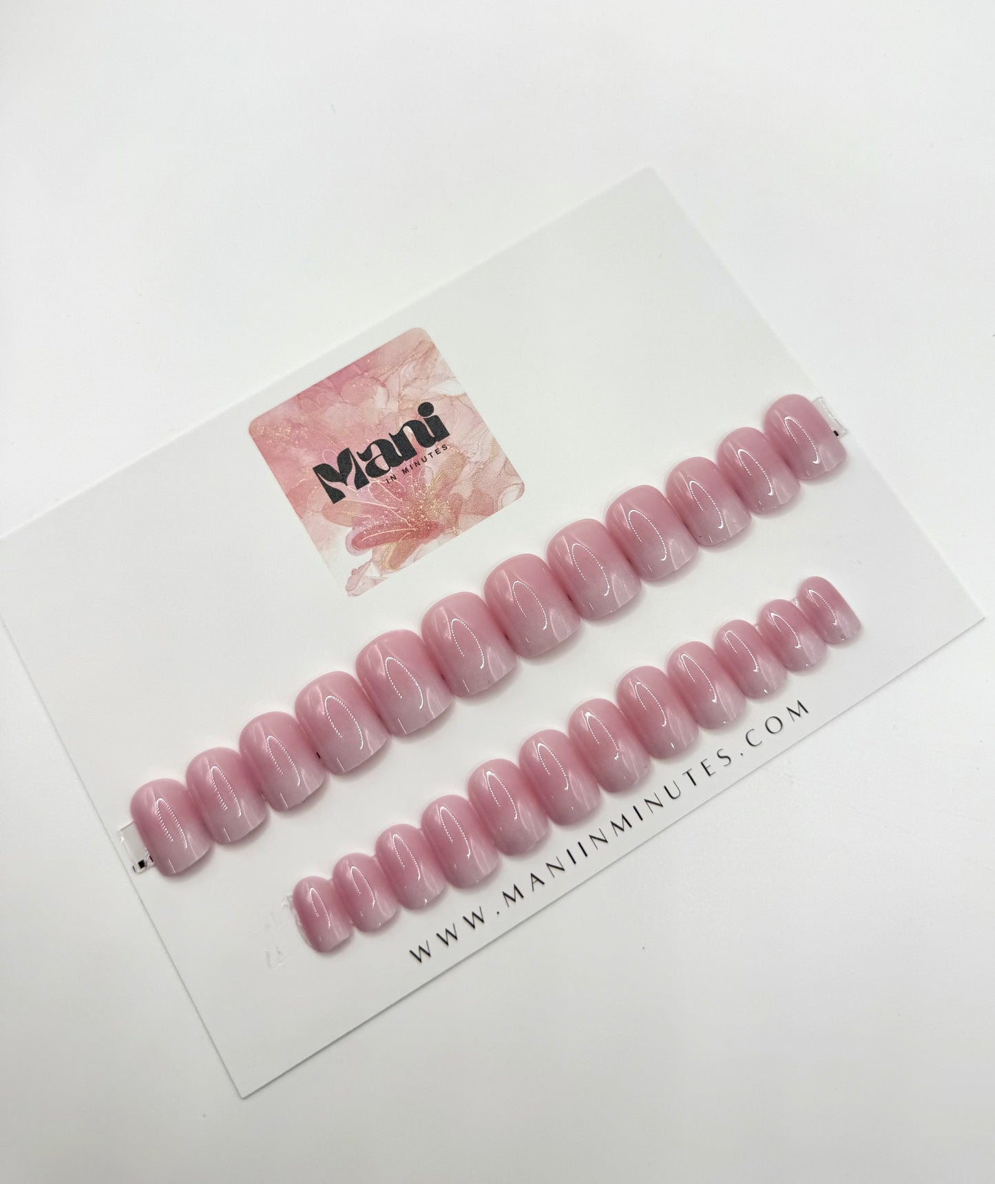 Subtle Pink Ombre nail set on Mani in Minutes card – short square press-ons with natural pink ombre design