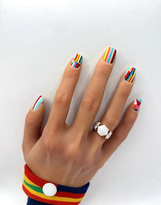 Geometric Glam press-on nails – bold rainbow geometric design by Mani in Minutes
