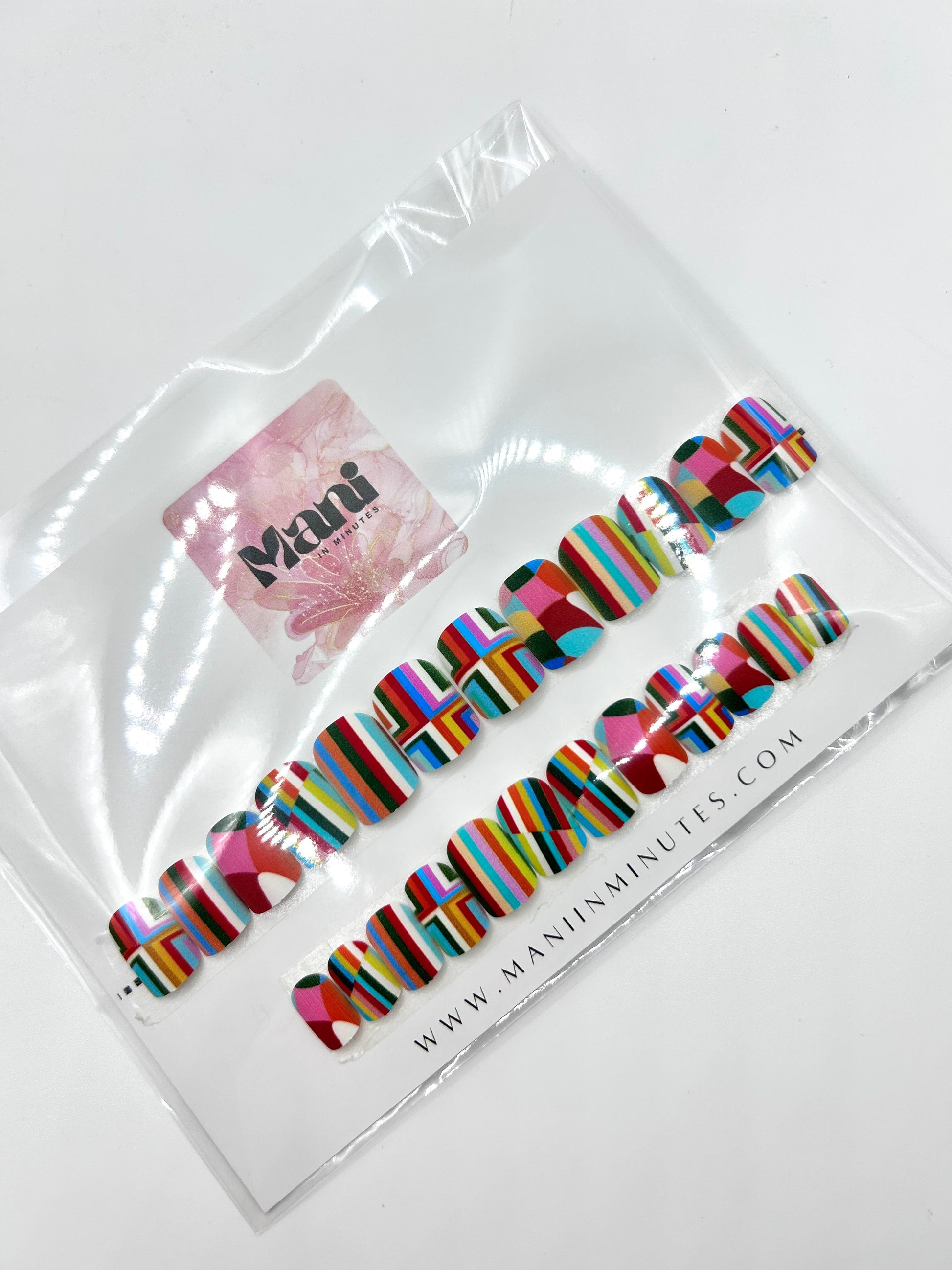 Geometric Glam press-on nails – bold rainbow geometric design by Mani in Minutes