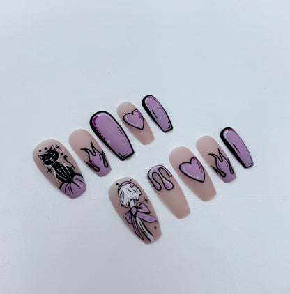 Medium coffin press on nails with cartoon-inspired artwork