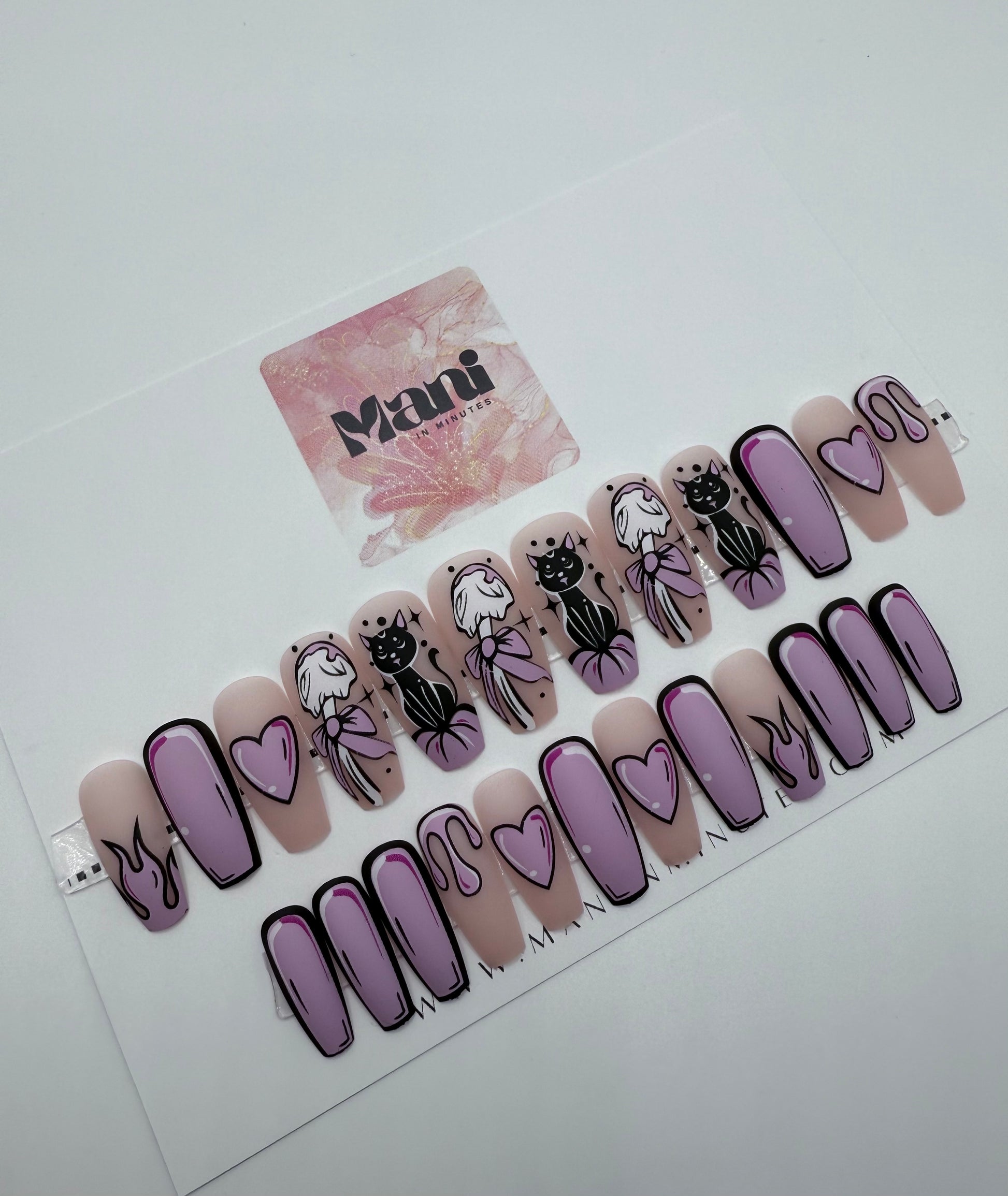 Toon Mood press-on nails with pop art design on card